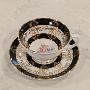 Royal Graftoy Luxury Black and Gold Floral Teacup and Saucer 1940s.